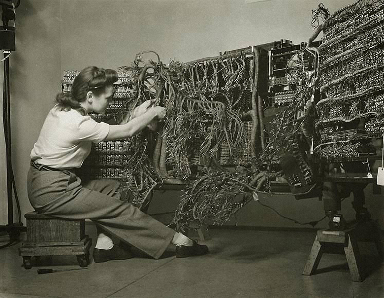 Berenice Abbott- Woman wiring an early IBM computer
